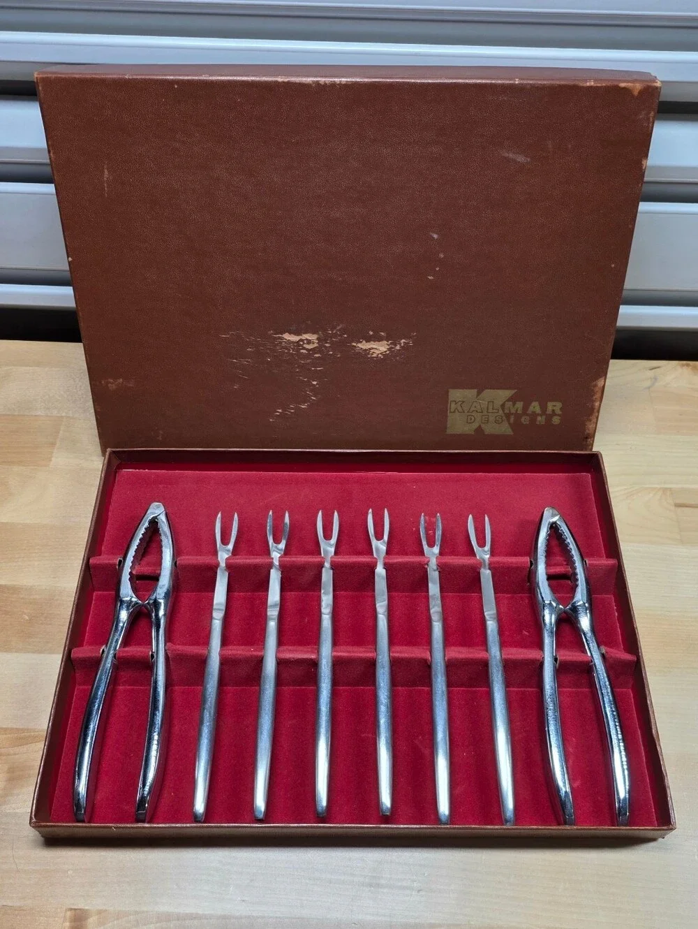 Kalmar Designs Chrome Nutcracker and Cocktail Fork Set - Red Velvet Box